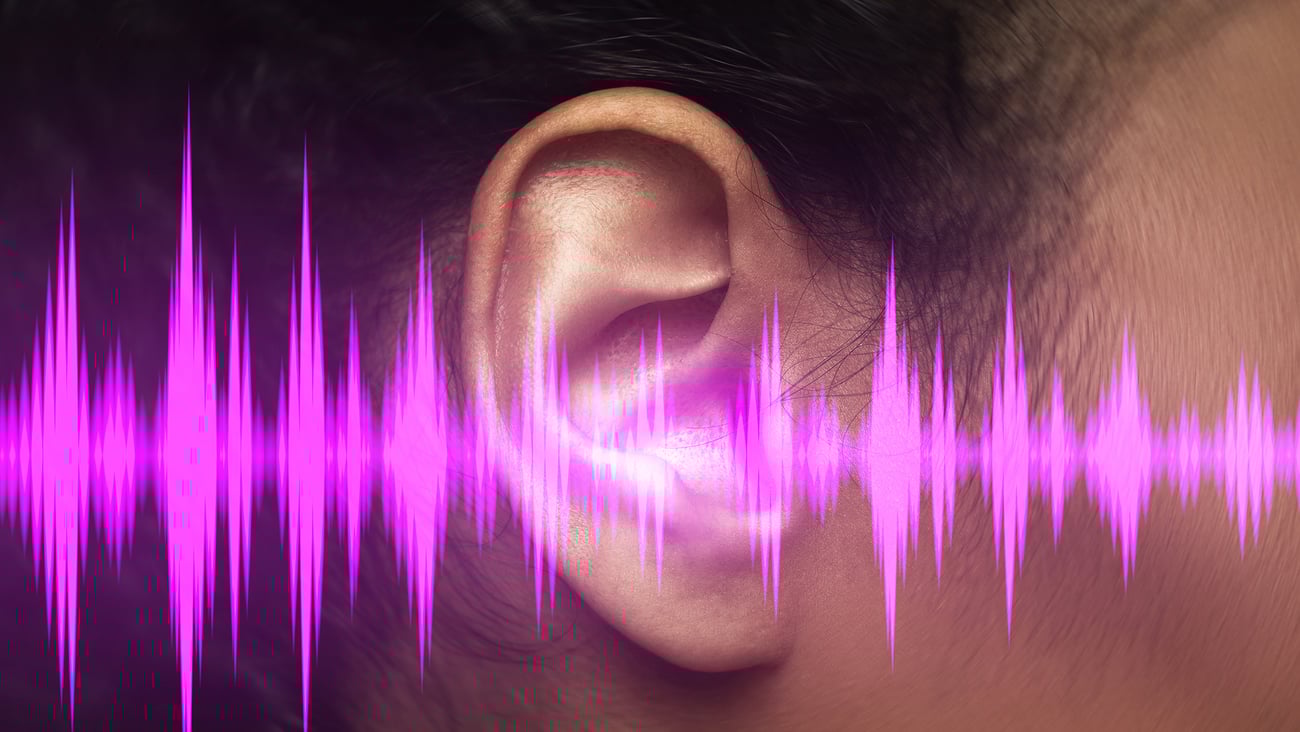 Oreille avec fréquences sonores