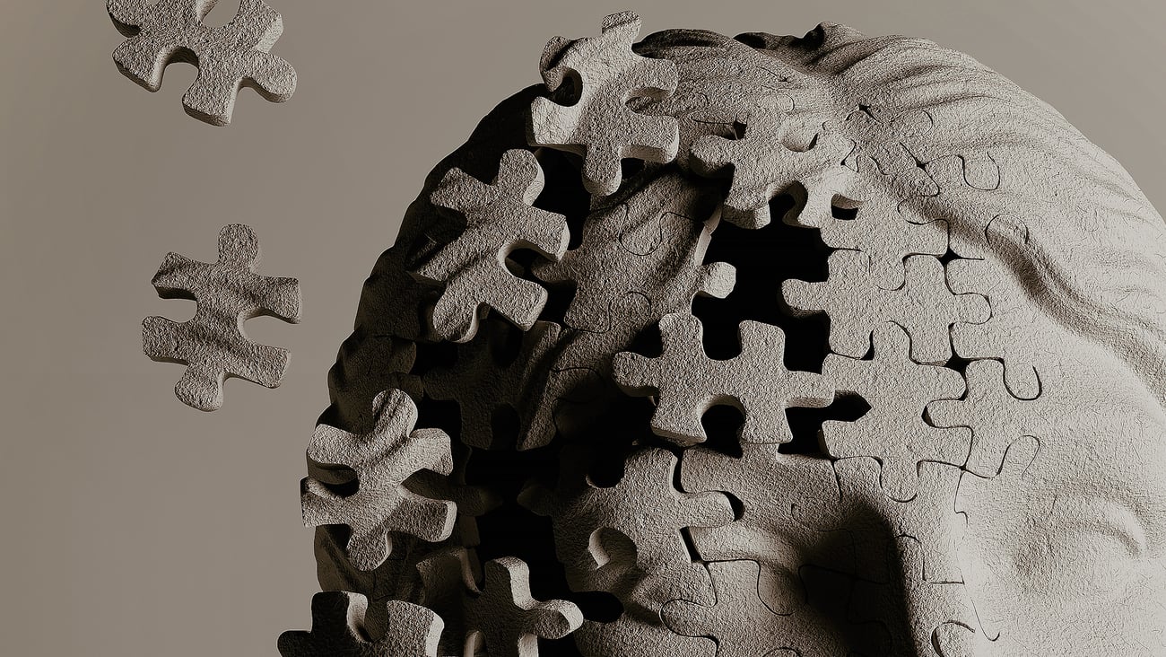 Visage composé de morceaux de casse-tête qui s'envolent