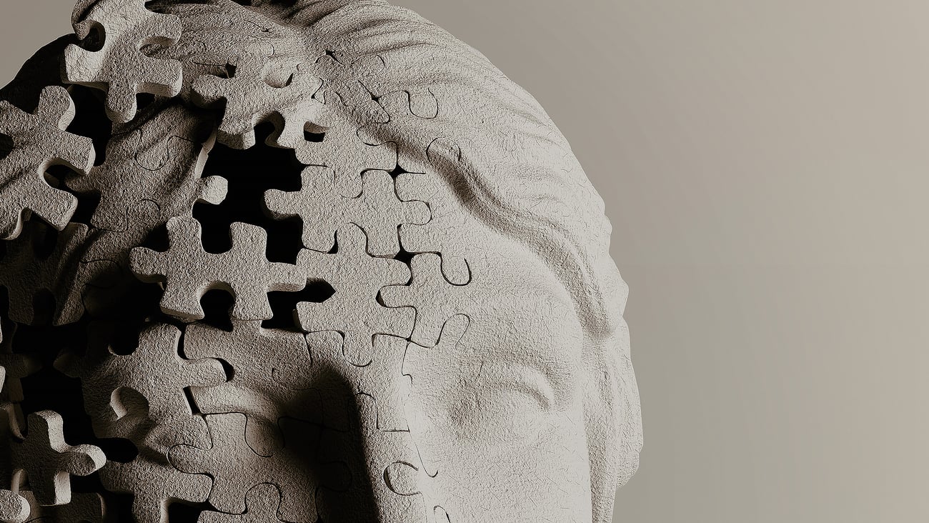 Visage composé de morceaux de casse-tête qui s'envolent