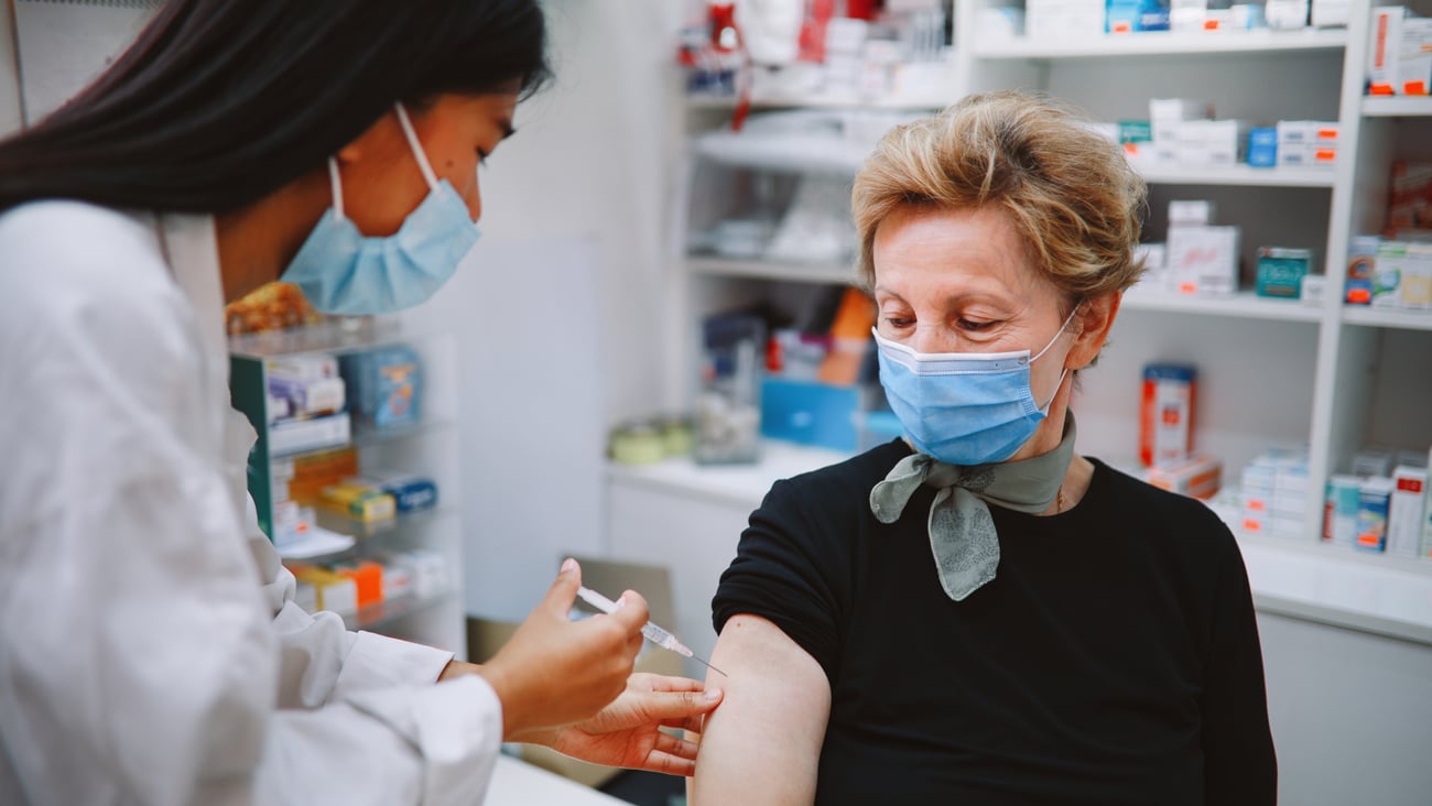 woman being vaccinated