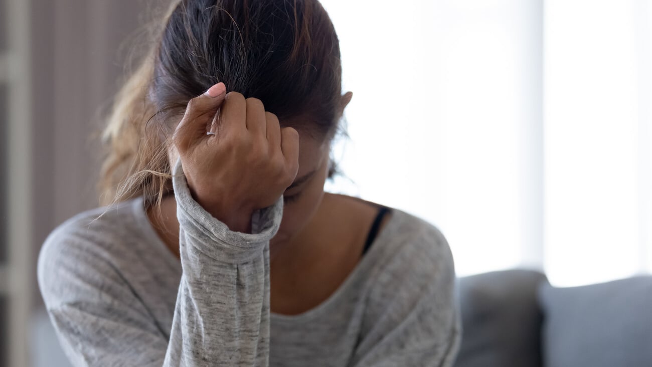 Depressed upset young woman feeling hurt sad stressed troubled with unwanted pregnancy, regret mistake abortion, having headache or drug addiction, suffer from grief dramatic bad problem concept; Shutterstock ID 1463204258