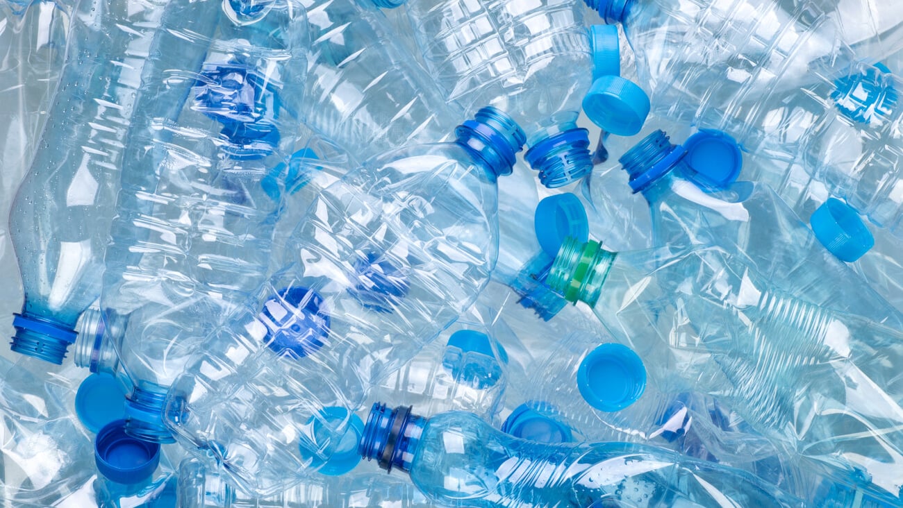 Plenty of plastic bottles on white background top view; Shutterstock ID 1684016206