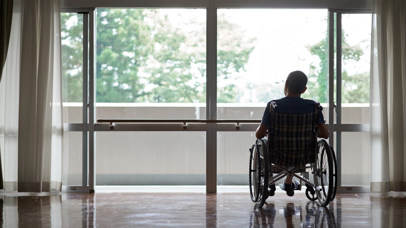 Elderly people in wheelchairs in long-term care facilities; Shutterstock ID 2007154457
