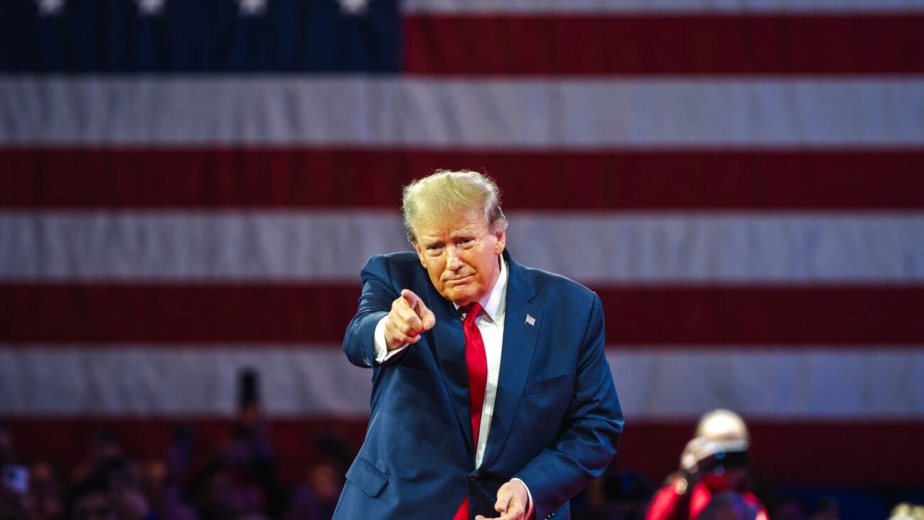 NATIONAL HARBOR, MD, USA- February 24, 2024: Donald Trump speaks at an event about his plan for defeating current President Joe Biden in November.; Shutterstock ID 2455396913