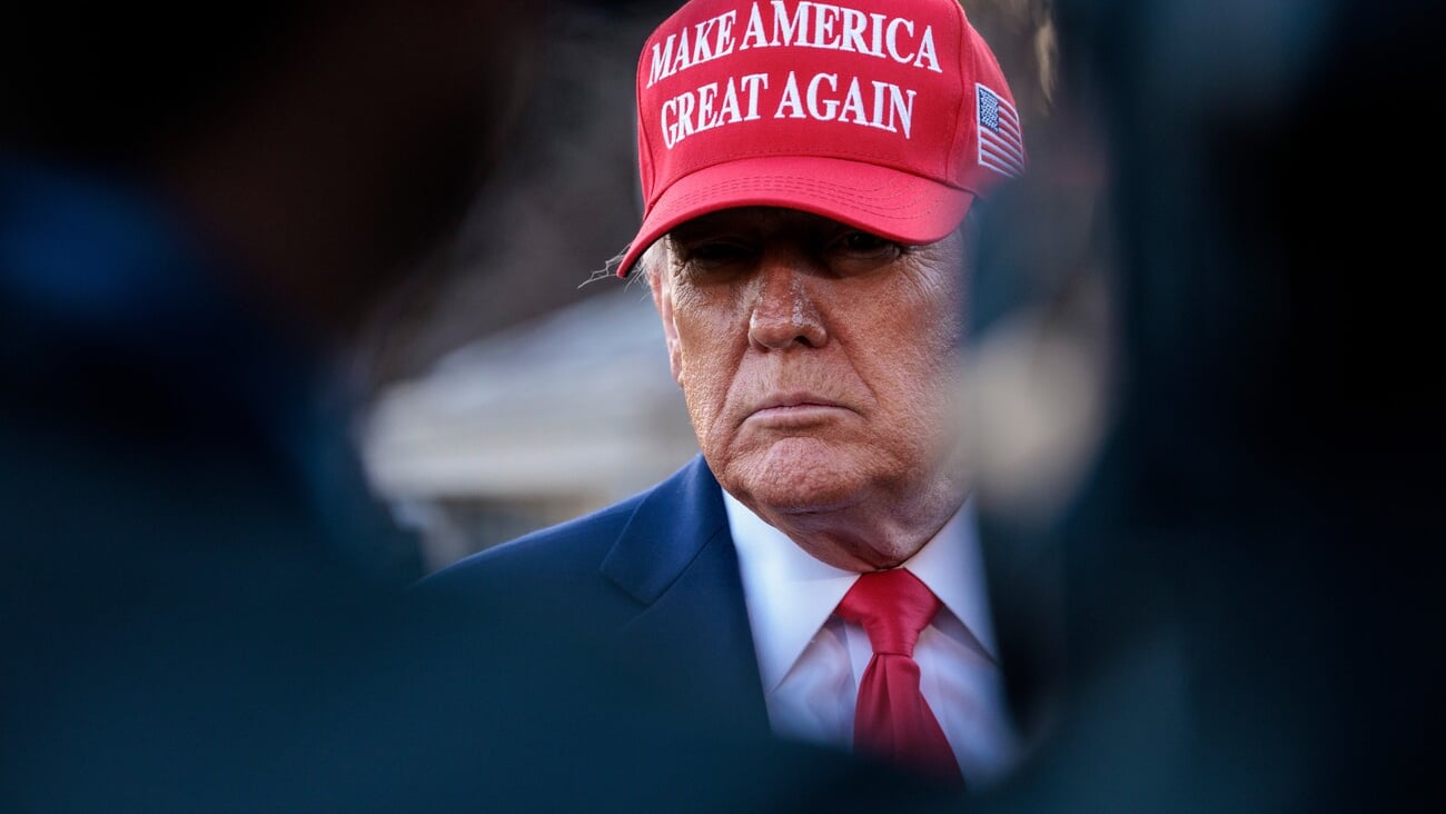 WASHINGTON - Feb 28 2025: President Donald Trump speaks to reporters on the South Lawn of the White House after his meeting with Ukrainian President Volodymyr Zelenskyy, before boarding Marine One. ; Shutterstock ID 2593377925