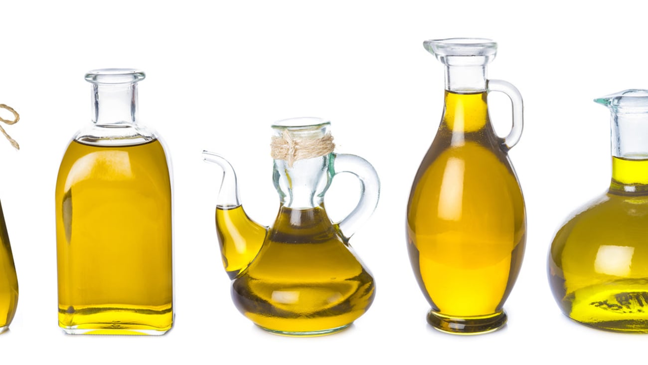 Set of extra virgin olive oil jars isolated on a white background; Shutterstock ID 546502276