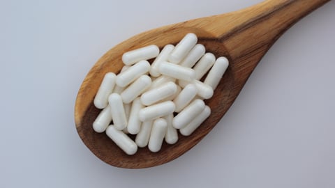 Cuillère de suppléments en capsules