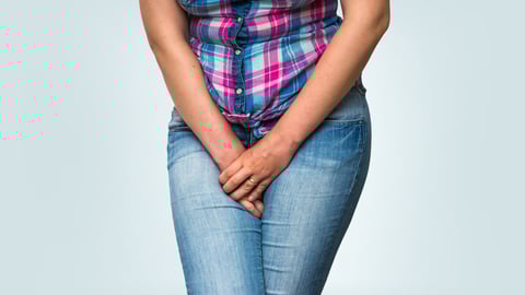 Woman with hands holding her crotch, she wants to pee - urinary incontinence concept; Shutterstock ID 478572847