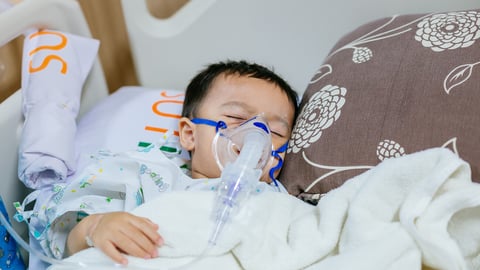 Asian little boy has sick sleep on bed in hospital. he needs fluid replacement.; Shutterstock ID 491584270